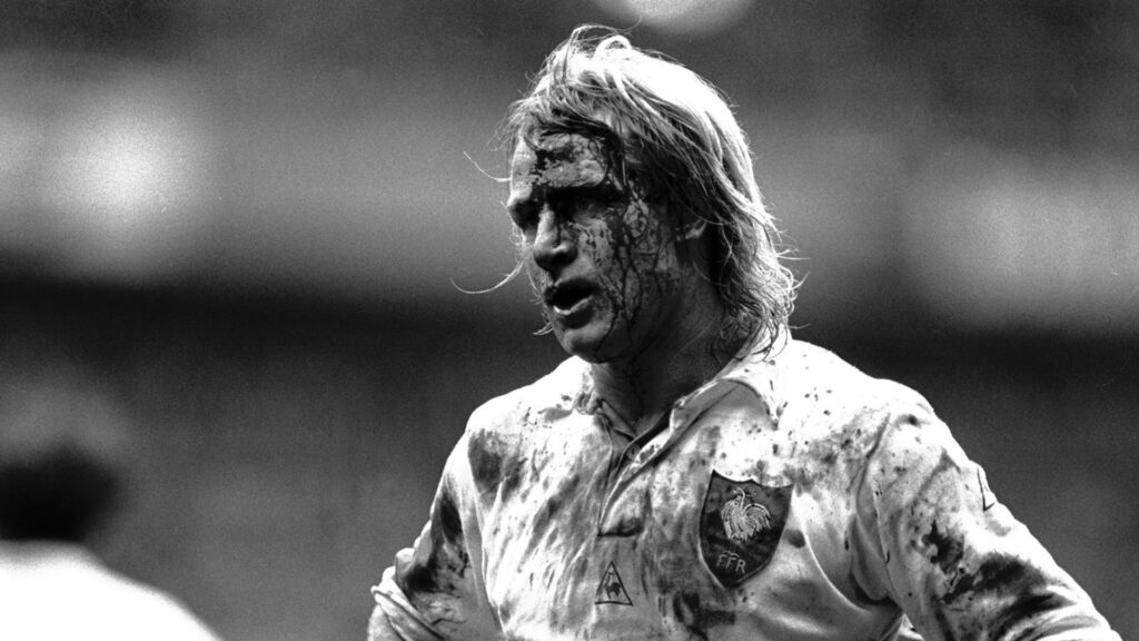 La photo de rugby, le regard dans la boue