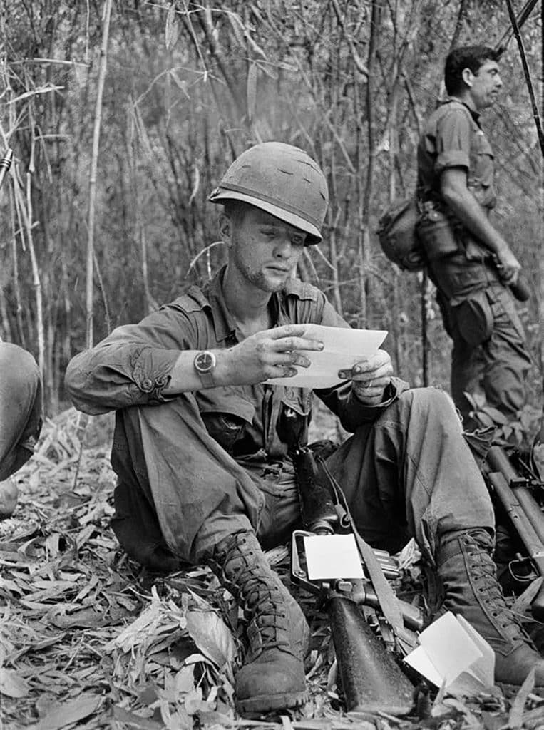 Photos by Catherine Leroy showing a US soldier reading a letter