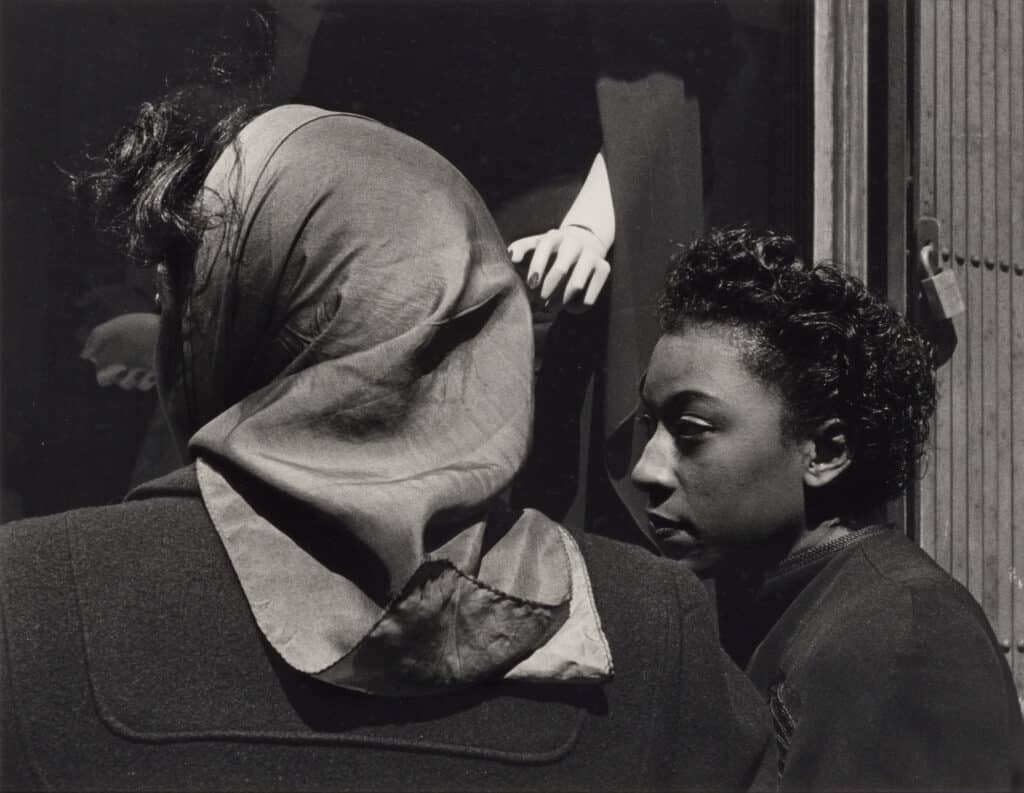 Roy DeCarava, Two women, mannequin's hand, 1952 © The Estate of Roy DeCarava. All rights reserved. Courtesy of the artist and David Zwirner
