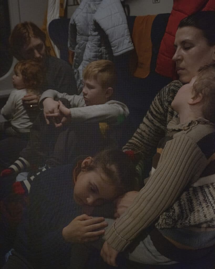 In a train of refugees to Warsaw, Poland. March 6, 2022 © Ismail Ferdous / VU' for Blind