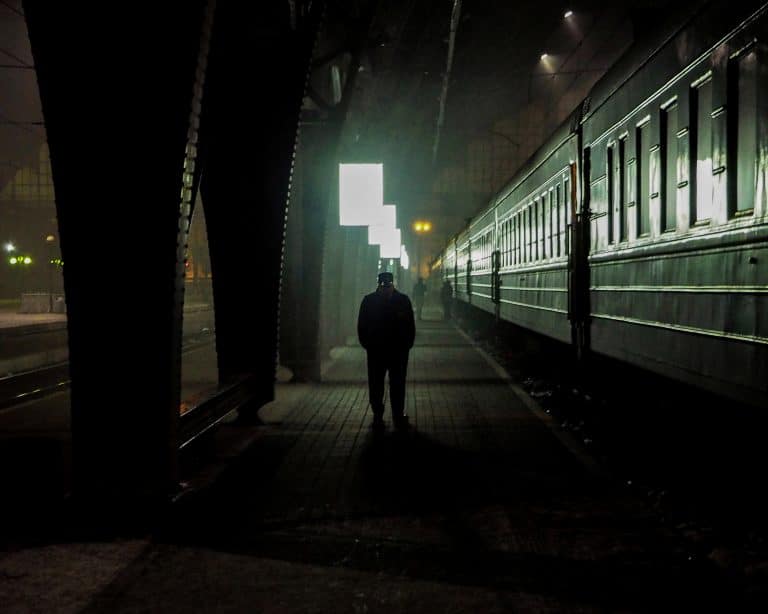 A Ukrainian controller walks on the platforms in the train station in Lviv, western Ukraine. © Rafael Yaghobzadeh