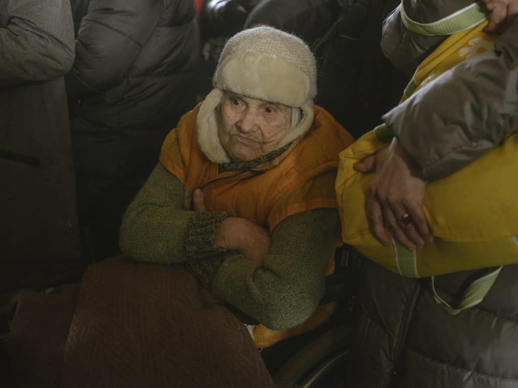 The waiting hall of the train station in Chop. All Ukrainian displaced people are waiting for the next train to Hungary or Slovakia. March 15, 2022 Grandmother of Oleksandra There was a family with a grandmother in a wheelchair, they came from Kyiv. Oleksandra took her parents, grandmother, and cat away. Before the war, Oleksandra worked as an English teacher and was also doing translations, now she will look for a job abroad, but not sure where exactly. March 15, 2022 © Ismail Ferdous / Agence VU' for Blind