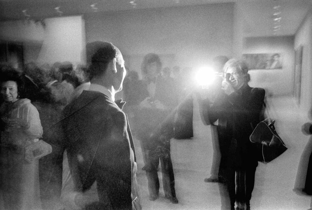 Andy Warhol photographing David Whitney, Corpus Christi, Texas at the Art Museum of South Texas (AMST). @BobShaw