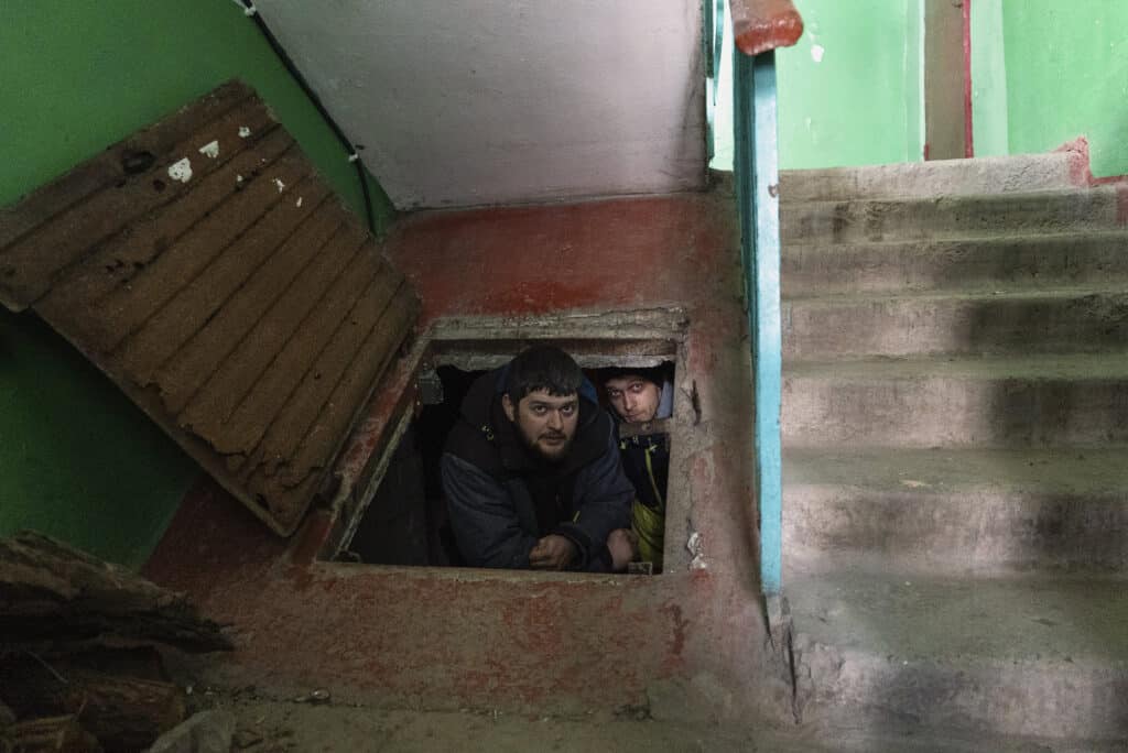 People shelter from shelling in the basement. Mariupol, Ukraine, March 12, 2022. © Mstyslav Chernov / Associated Press