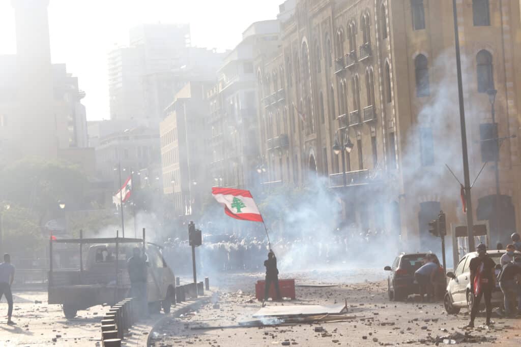 A few days after the explosion, angry demonstrators took to the streets. It was almost one year after the beginning of the “revolution” on October 17, 2019. Exhibition supported by the French Ministry of Culture and MICOL (France's interministerial coordination mission for Lebanon) © Tamara Saade