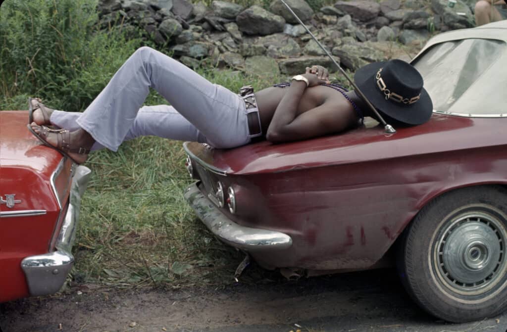 Woodstock, Resting on cars, 1969. ©Bill Eppridge Courtesy of Monroe Gallery of Photography