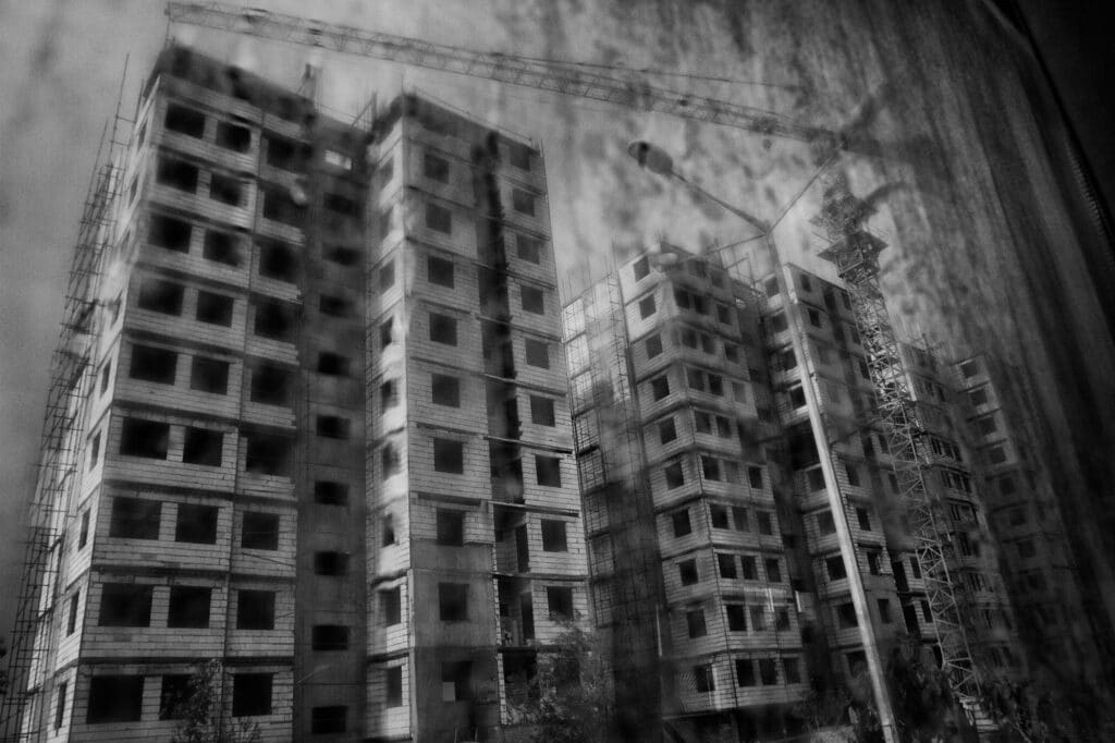 Cells of fear. Construction of cheap houses in Birjand, South Khorasan, Iran on May 4, 2014. With the increase of the economic crisis in Iran and the existence of severe economic inflation, starting a family and buying a house in Iran has become one of the main problems of the youth. The government dictating them to start a family and have children for the youth to rejuvenation the society. © Farshid Tighehsaz