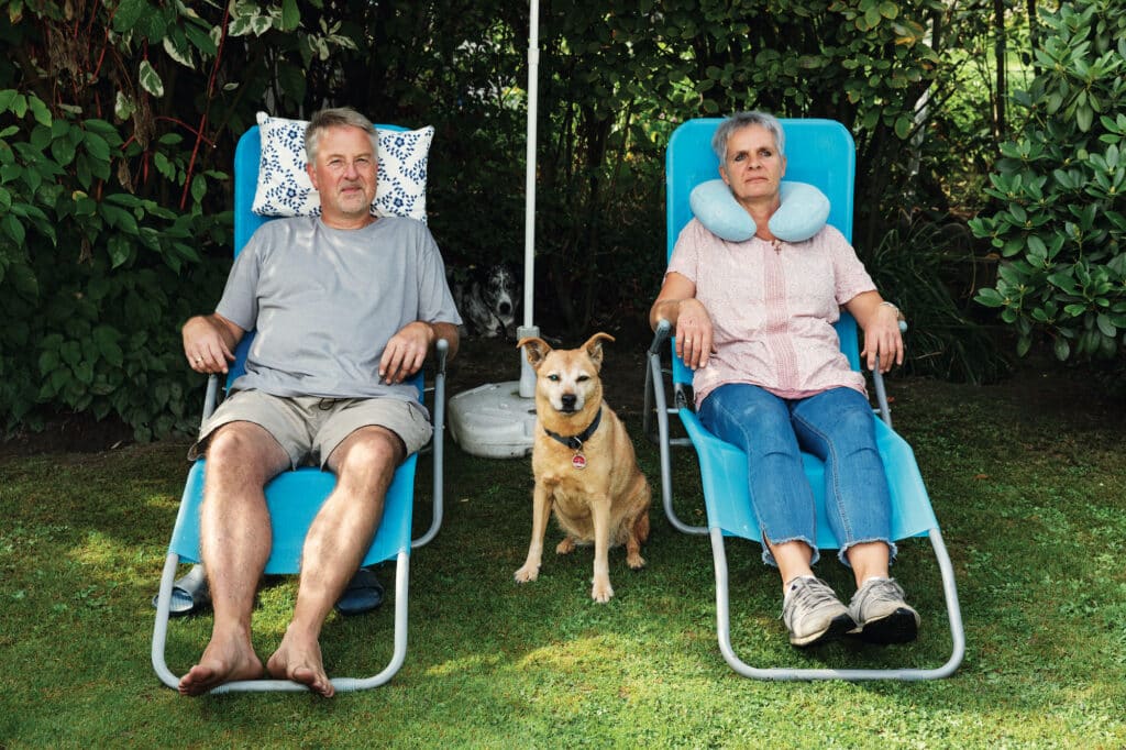 GERMANY. Dusseldorf. KGV. Am Schwarzen Weg. Klaus and Birgit Gickmann with dog Sheila. 2018. © Martin Parr / Magnum Photo