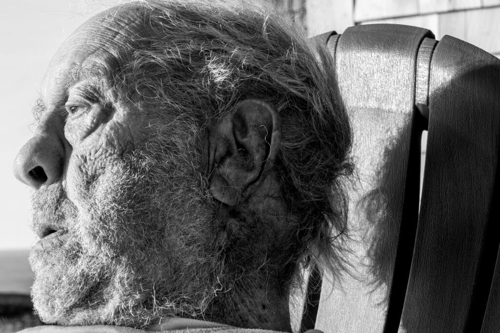 Robert Frank looking out at the ocean, Mabou, 2017. © Eugene Richards