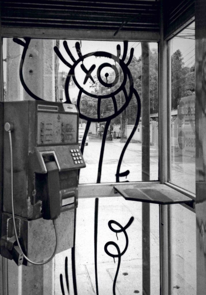 Photo of Mr. A on a phone booth © André Saraiva