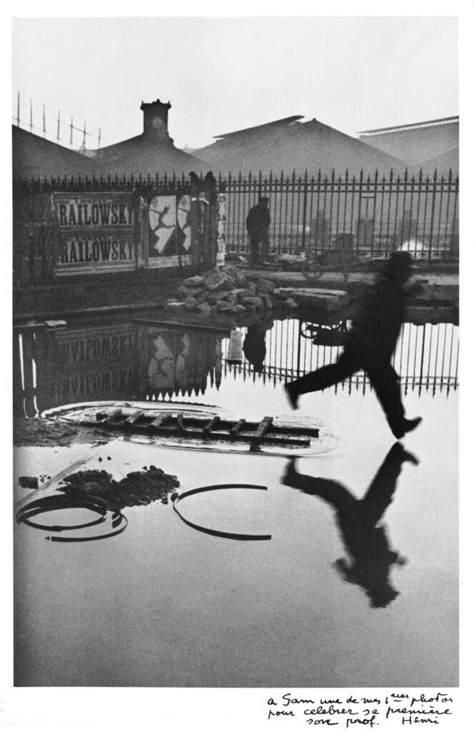 Behind the Saint-Lazare station, Place de l'Europe, Paris, 1932. © Henri Cartier-Bresson Foundation / Magnum Photos- Szafran Collection, Pierre Gianadda Foundation