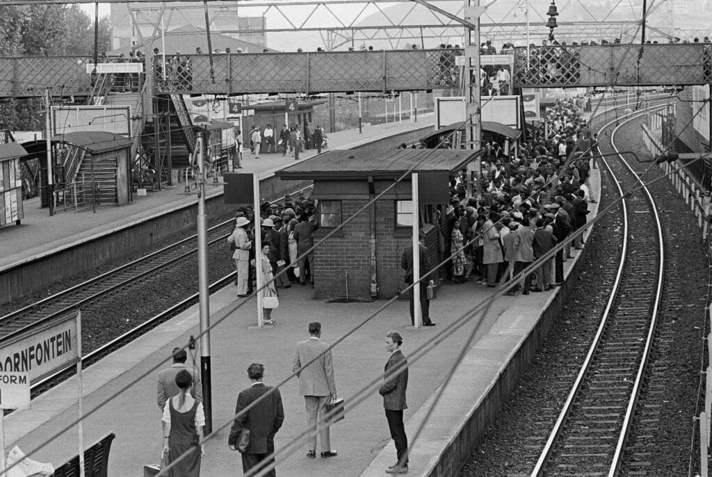 Doornfontein railway station in rush hour. This picture shows the reality of apartheid without the need for any words. South Africa, 1960s. All images from South Africa, 1960s. © Ernest Cole/Magnum