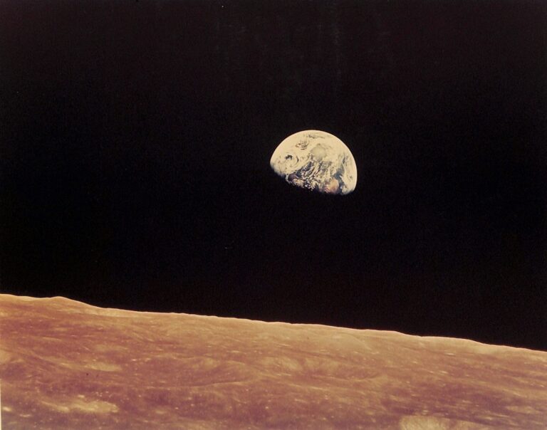 Apollo 8 - First man-made color photograph of Earthrise - December 24, 1968. William Anders