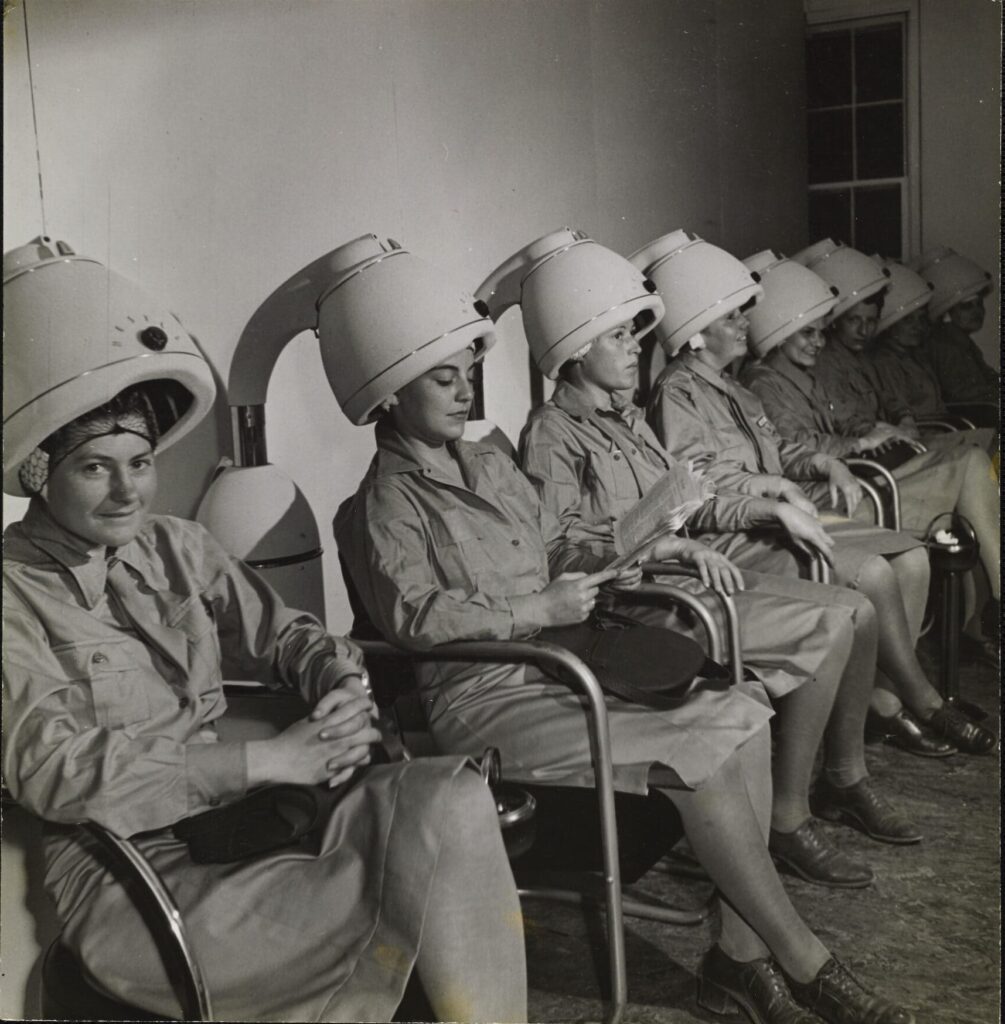 TONI FRISSELL, WAAC (Women's Army Auxiliary Corps) officers sitting under hair dryers, 1943, Vogue © Condé Nast