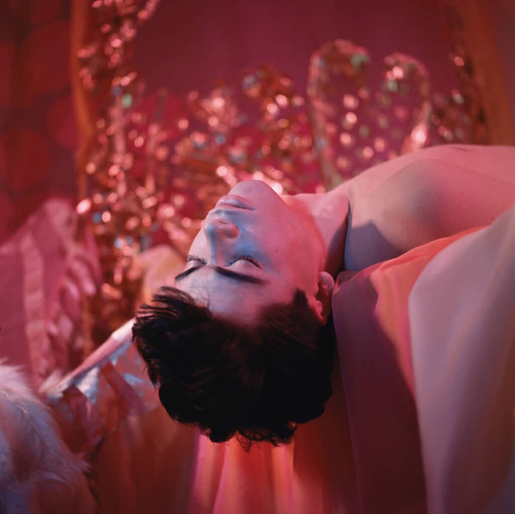 Hanging Off Bed (Bobby Kendall), mid-to-late 1960s. © Estate of James Bidgood / Courtesy of CLAMP, New York, NY