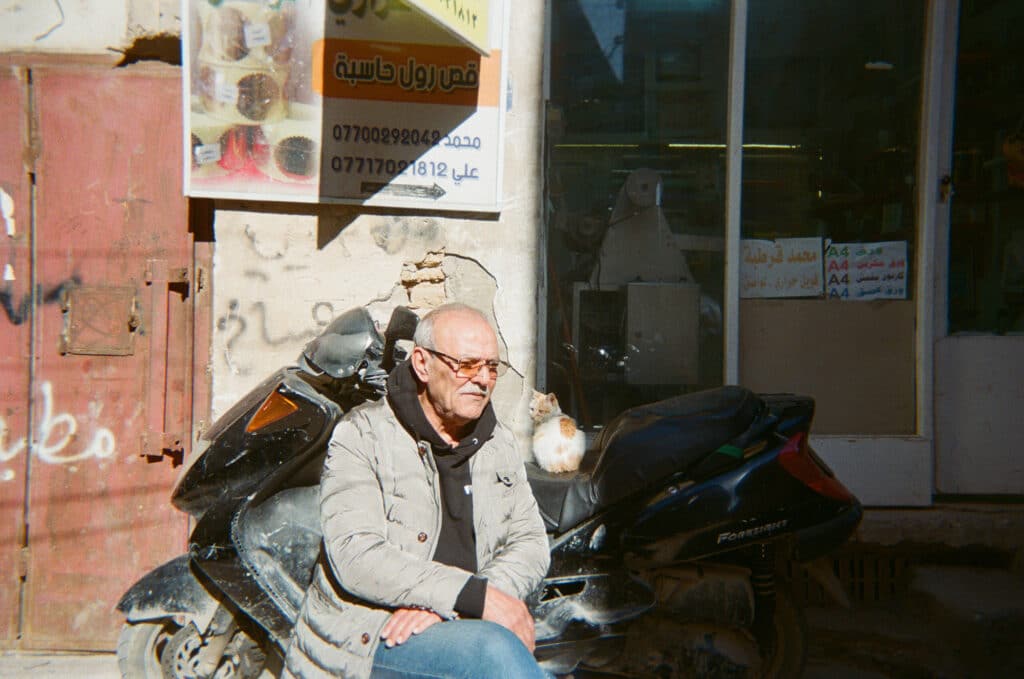 Photo: Salam Karim, Baghdad I came across a man with his cat sharing his loneliness in the winter days loaded with nostalgia and I took this picture when they were enjoying the sunshine during break time from work.