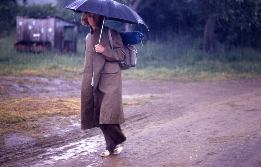 Guy arriving in rain © Paul Misso