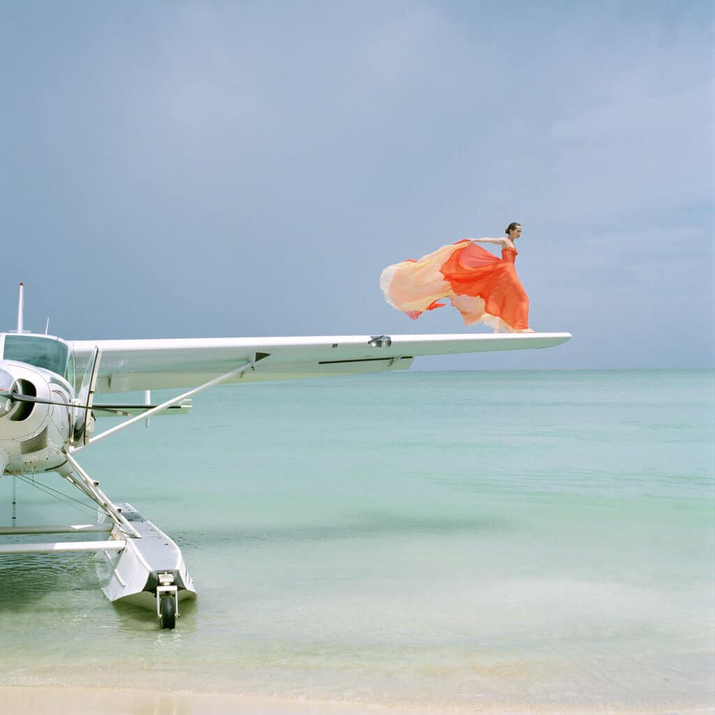 Saori on Seaplane Wing, Dominican Republic, 2010 © 2023 Rodney Smith Ltd., courtesy of the Estate of Rodney Smith