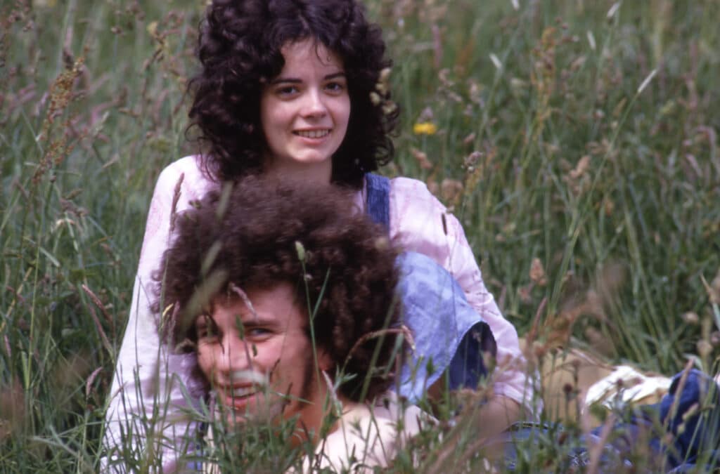 Young lovers in field