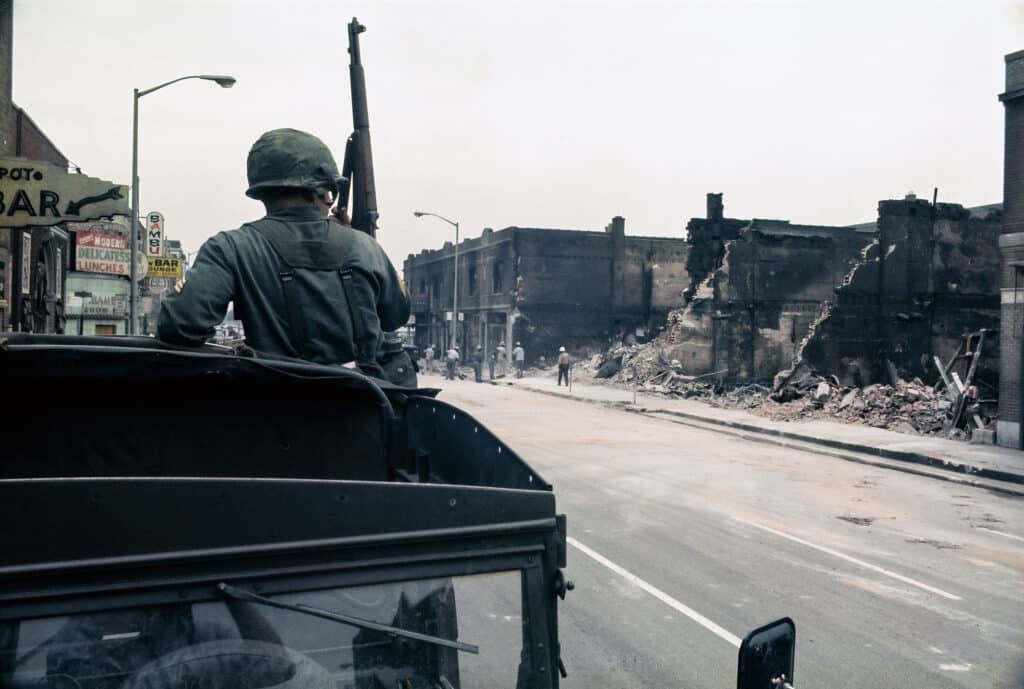 A National Guardsman stands watch in Newark, July 1967 - photo credit Bud Lee_Estate of Bud Lee