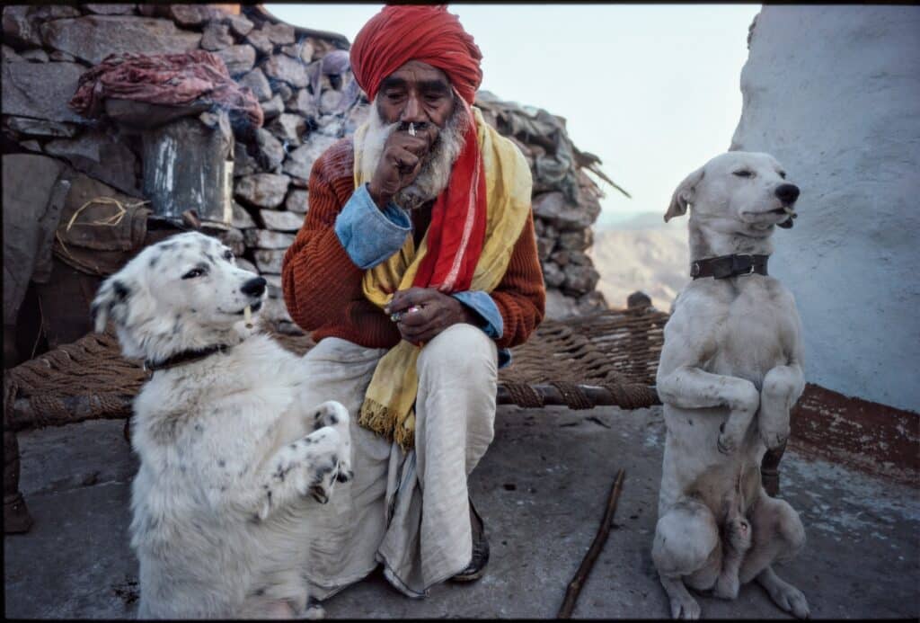 Dog trainer, Old Delhi, 1979, Cibachrome © 2023 Mary Ellen Mark