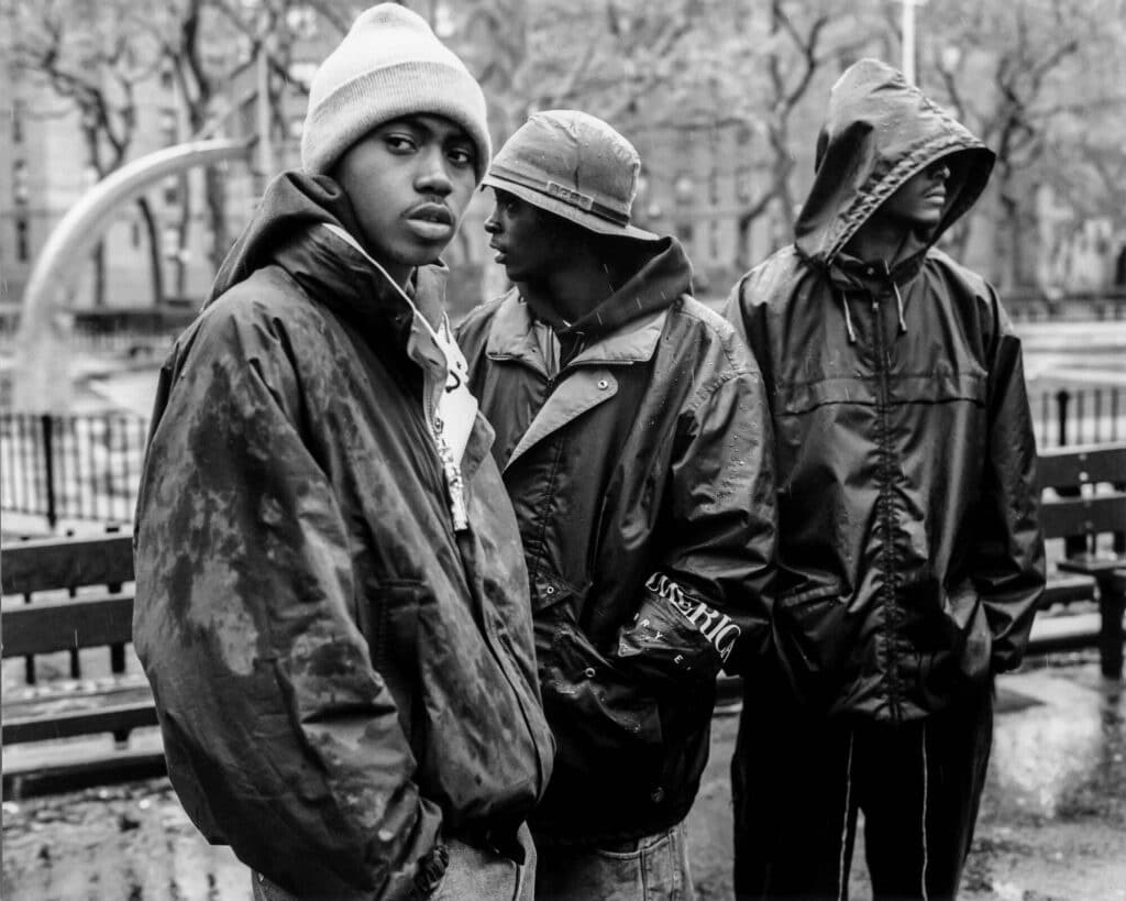 Nas kickin it with his boys at the Queensbridge projects, Long Island City, New York. © Peter Spirer