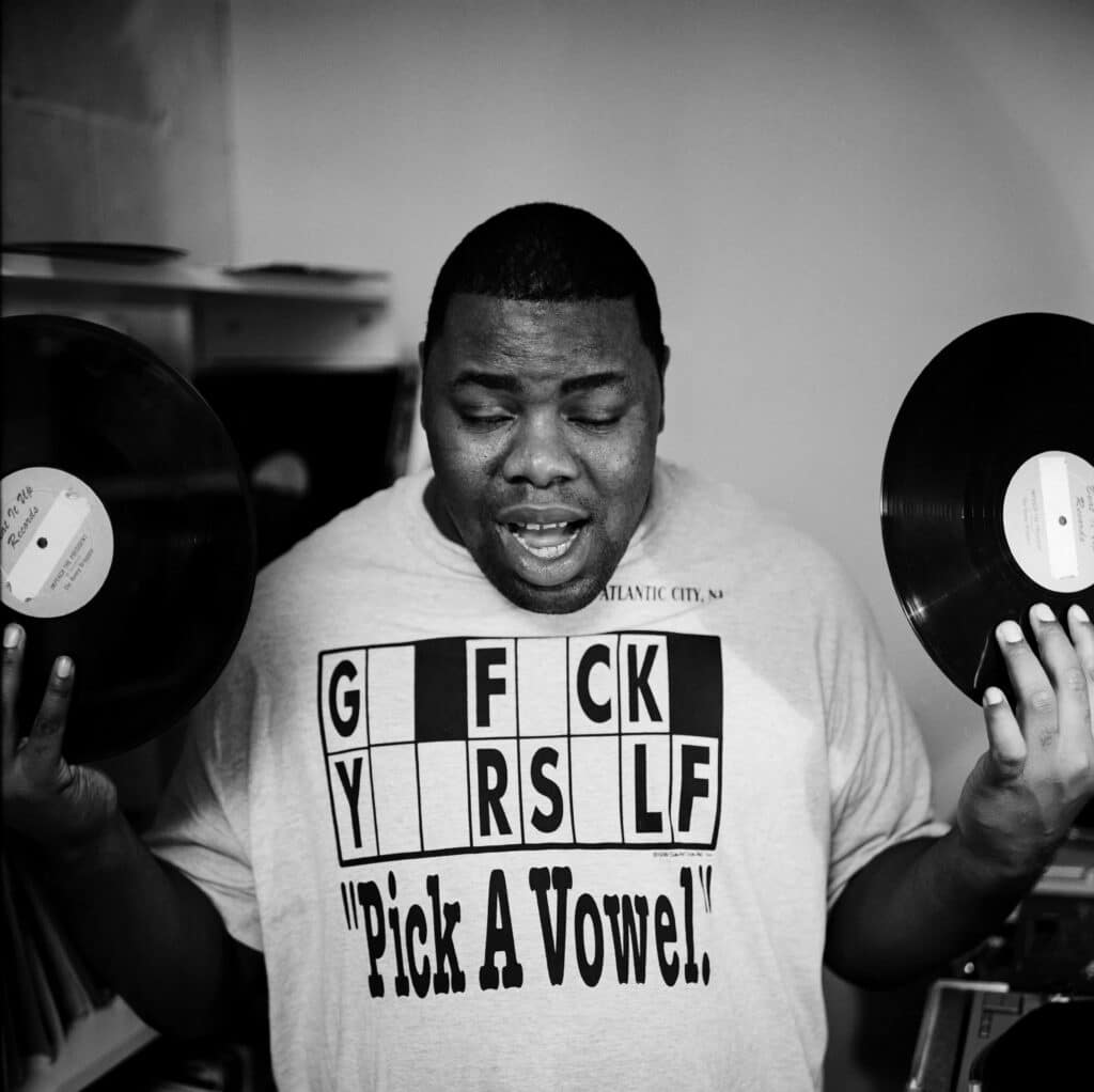 Biz Markie in his Baltimore, Maryland home wearing my favorite T-shirt. Biz Markie, RIP. © Peter Spirer