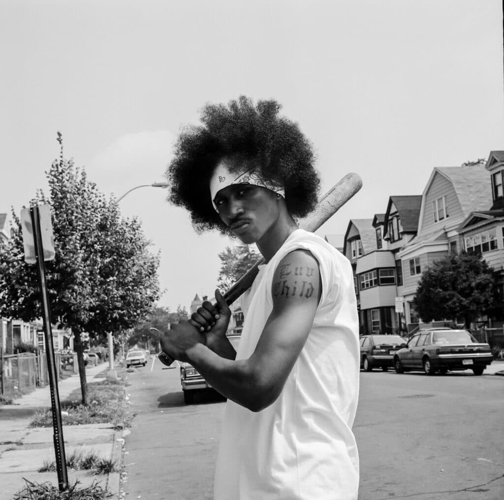 Luv Child with a baseball bat in Newark, New Jersey. © Peter Spirer