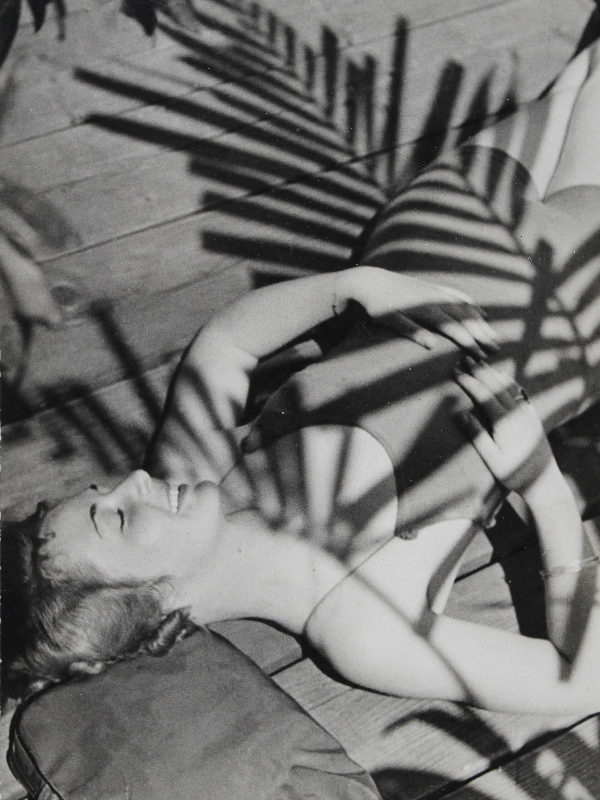 Woman in swimsuit with plants shadows, 1932 Vintage print © Paul Wolff / Collection Christian Brandstätter